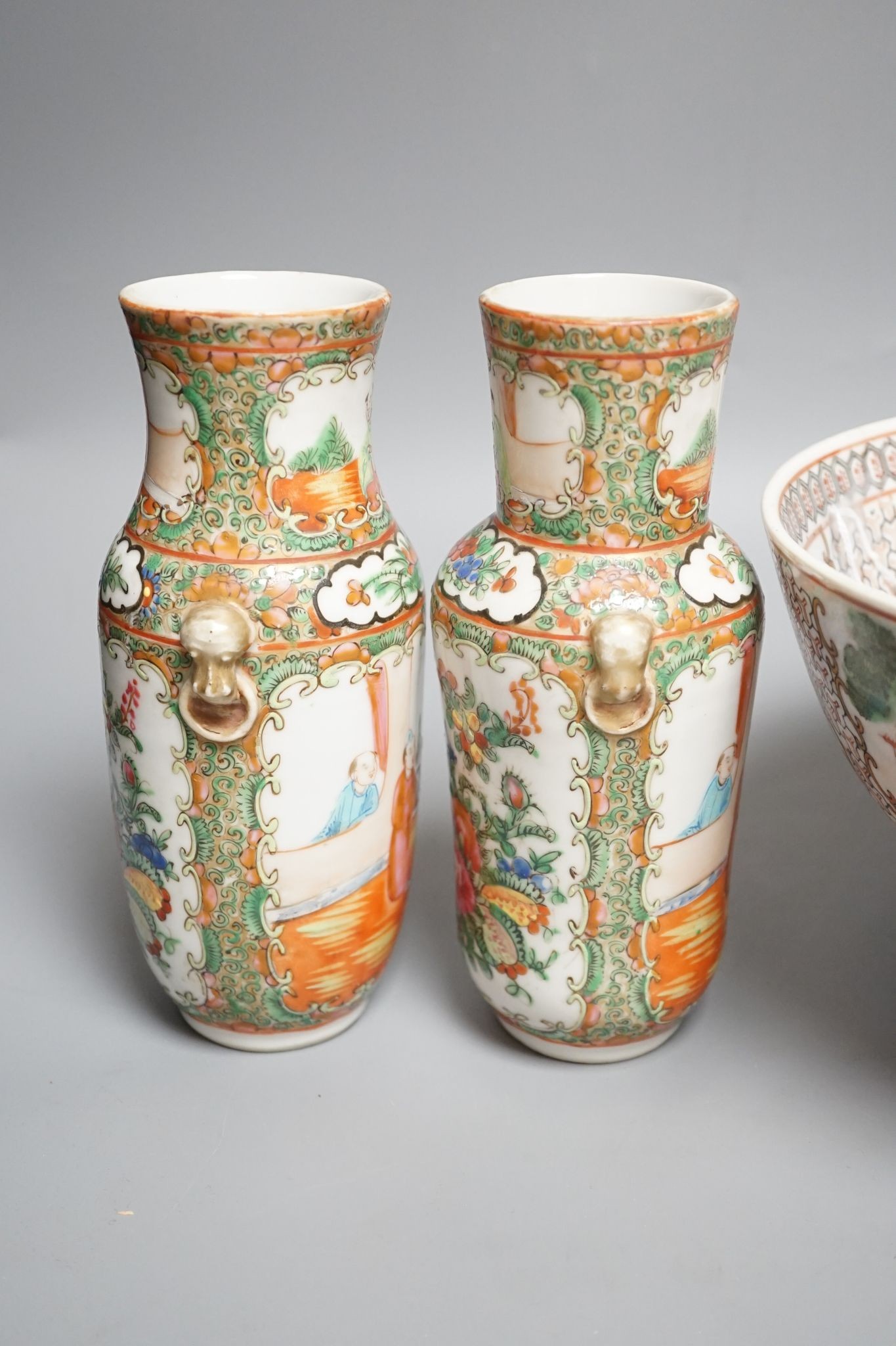 A pair of Chinese Canton famille rose vases and a bowl on stand